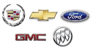 American car manufacturer logos including Ford, GM, and Chrysler